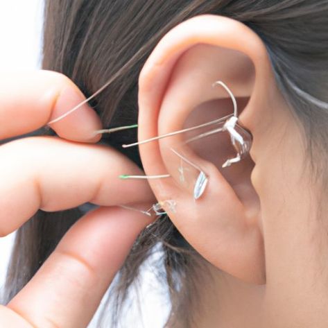 Akupunktur iğnesinin tekrar tekrar kullanılması Kore kulak presi dört delikli tek iğne